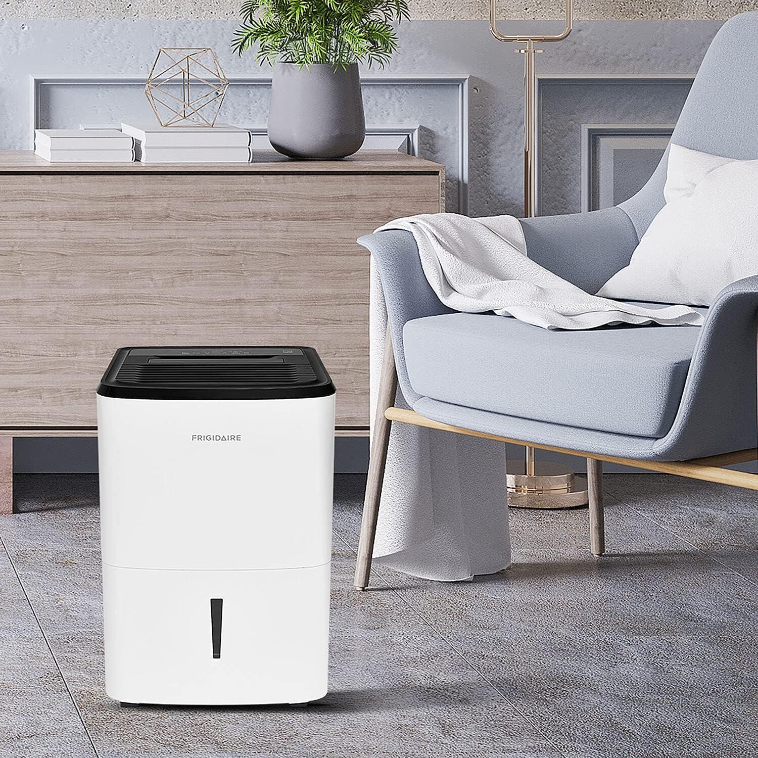 imageFrigidaire 50Pint Portable Dehumidifier for Basement Home and Attic 115V Quiet Moisture Absorber for Humidity Control with Auto ShutOff and Removable Water BucketContinuous Drain Option White50 Pints
