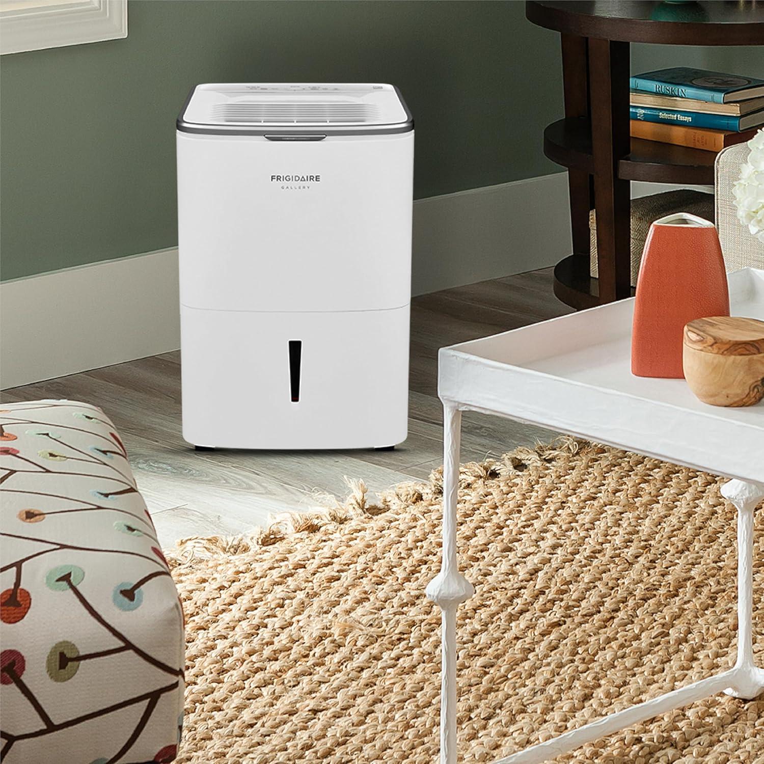 imageFrigidaire 50Pint Portable Dehumidifier for Basement Home and Attic 115V Quiet Moisture Absorber for Humidity Control with Auto ShutOff and Removable Water BucketContinuous Drain Option White50 Pints