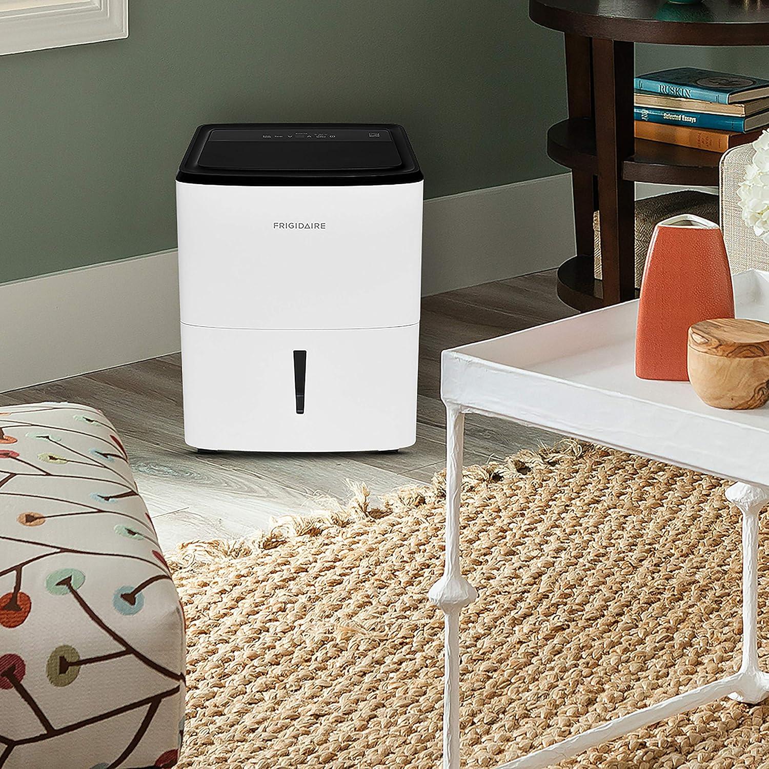 imageFrigidaire 50Pint Portable Dehumidifier for Basement Home and Attic 115V Quiet Moisture Absorber for Humidity Control with Auto ShutOff and Removable Water BucketContinuous Drain Option White35 PINT