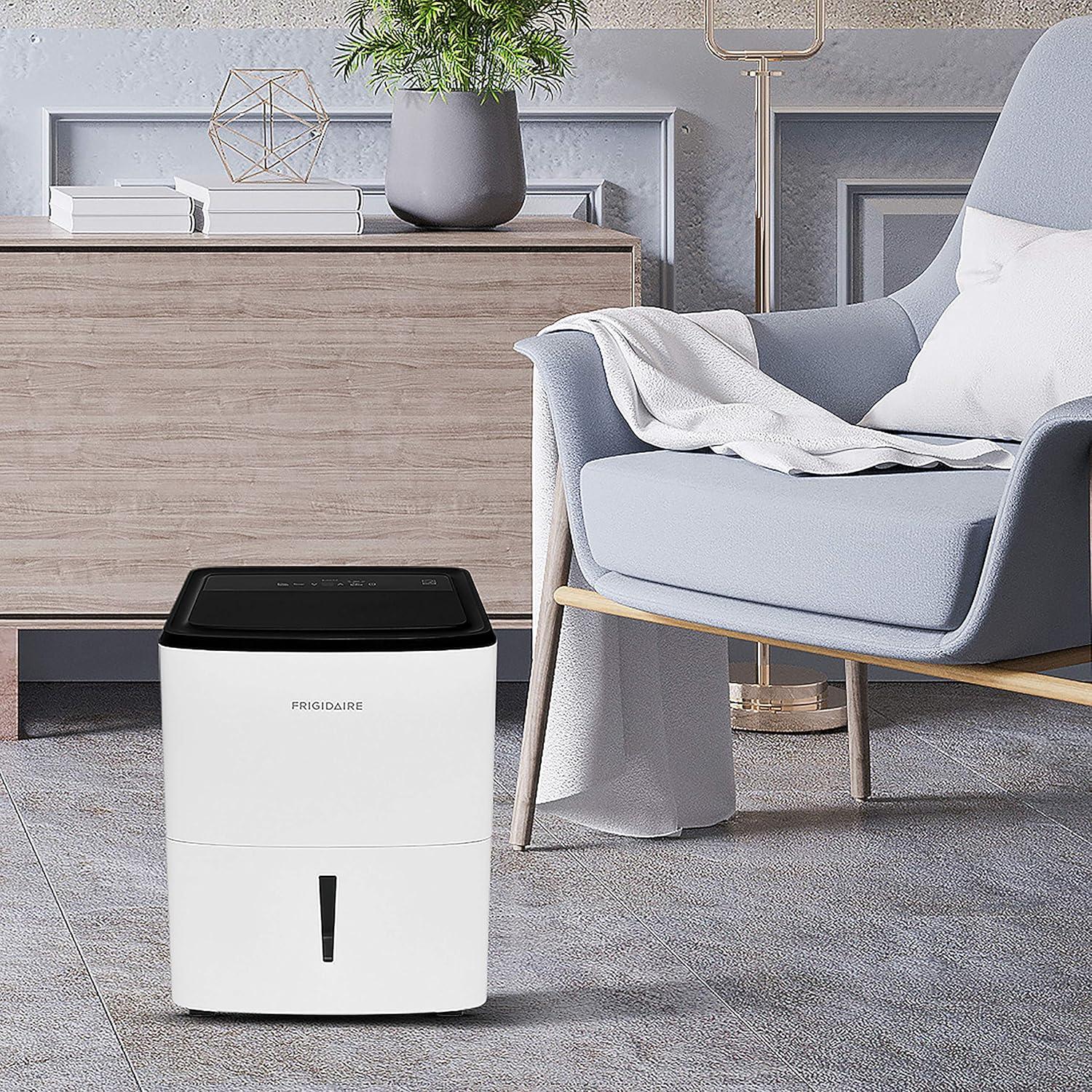 imageFrigidaire 50Pint Portable Dehumidifier for Basement Home and Attic 115V Quiet Moisture Absorber for Humidity Control with Auto ShutOff and Removable Water BucketContinuous Drain Option White35 PINT