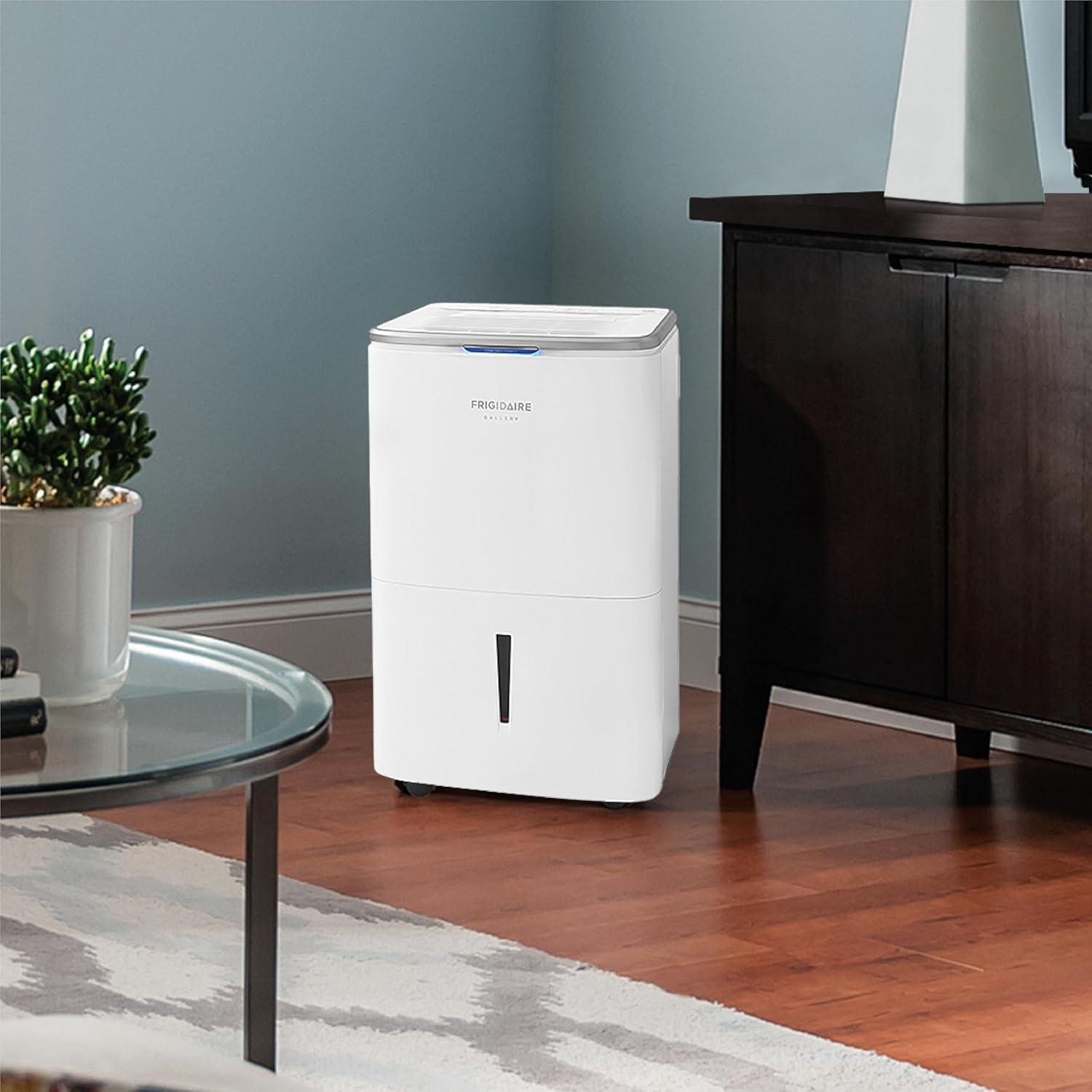 imageFrigidaire 50Pint Portable Dehumidifier for Basement Home and Attic 115V Quiet Moisture Absorber for Humidity Control with Auto ShutOff and Removable Water BucketContinuous Drain Option White50 Pints